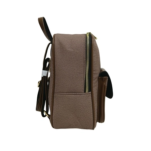 Detail of high-quality brown twill canvas and leather straps on stylish backpack