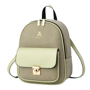 Minimalist green and beige woven backpack with gold metal twist lock and top handle