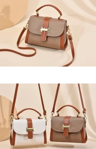 Detail of vintage patchwork crossbody bags with H-shaped gold buckles and pebbled texture