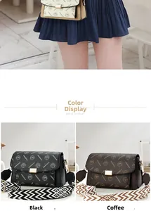 Close-up of printed crossbody bags in black and coffee with geometric straps