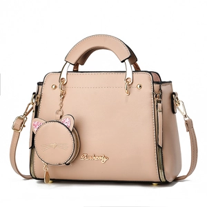 Elegant Danbaoly beige handbag with cute cat charm and adjustable shoulder strap