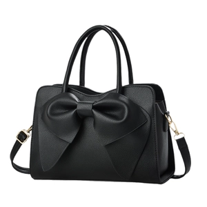 Elegante schwarze Handtasche mit Schleife aus strukturiertem Leder und abnehmbarem Gurt