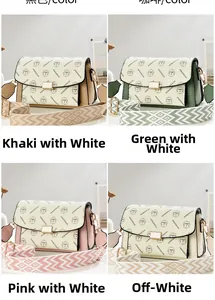 Detail view of the four color options for the crossbody bag with textured printed patterns