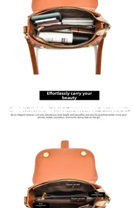Detail view of the brown leather crossbody bag featuring multiple interior compartments