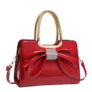 Red bow handbag with crocodile texture, rhinestones and golden woven metal handles