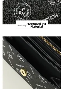 Detail showing the textured black PU leather fabric and gold metal clasp of the bag