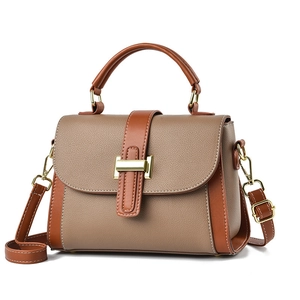 Chic two-tone khaki and brown crossbody bag with gold buckle and adjustable strap