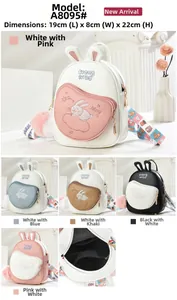 Detail view of mini rabbit ear backpack measuring 19x8x22cm with plush ball charm