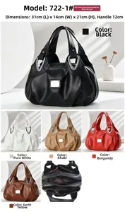 Detail view of large capacity tote bag featuring pleated faux leather and metallic accents