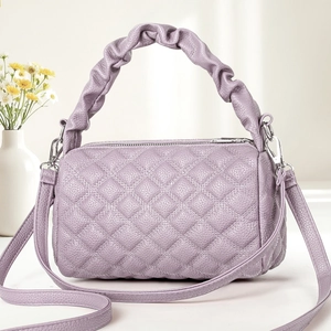 Quilted lavender small square bag with ruched handle and adjustable crossbody strap