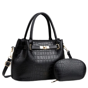 Two-piece black crocodile pattern handbag set with crossbody strap and gold hardware