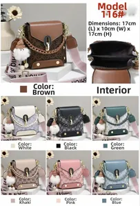 Macro detail of compact crossbody square bag with vintage logo print and plush charm