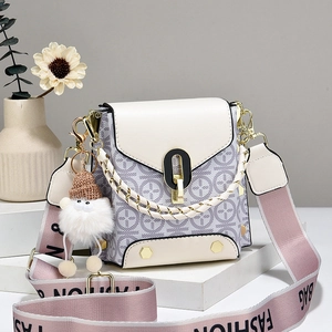 Chic small square crossbody bag with patterned grey fabric and white leather flap