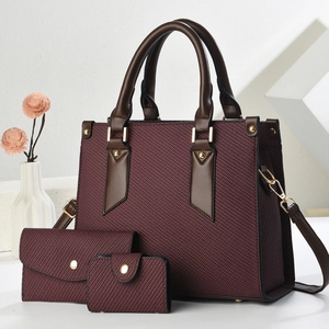 Burgundy 3-piece handbag set featuring a large tote, envelope wallet, and card holder