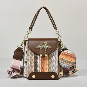 Bohemian woven handbag with leather flap, swan metal buckle and wide logo strap