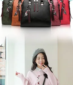 Collection of retro lychee pattern handbags in five colors with cute cat charms