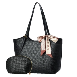 Large black textured tote bag set with matching pouch and decorative scarf on handle