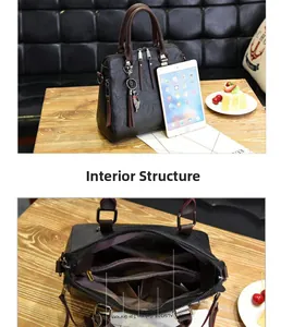 Detail view of the large capacity interior structure with a tablet for size reference