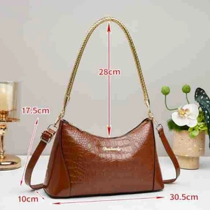 Detailed view of the brown snakeskin pattern tote bag with dimension measurement lines