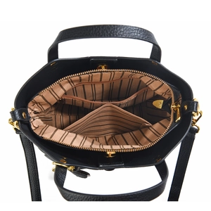 Top-down macro view showing striped lining and multi-compartment interior of black bucket bag