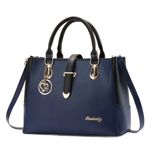 Large capacity dark blue contrast handbag with gold floral pendant and crossbody strap