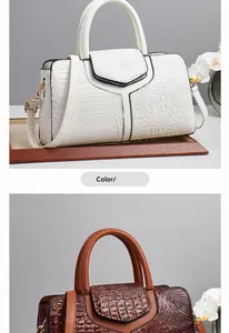 Detail of white and reddish-brown crocodile pattern handbags with rich leather texture