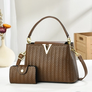 Two-piece dark brown handbag set with V-shaped weave pattern and gold hardware accents