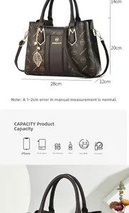 Detail view of large dark brown monogram tote bag with gold leaf pendant and dimensions