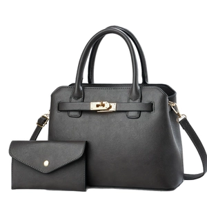Classic black leather two-piece handbag set featuring a tote bag and matching wallet