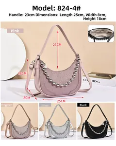 Detail view of crescent hobo bag with sequin finish and metal bead chain strap