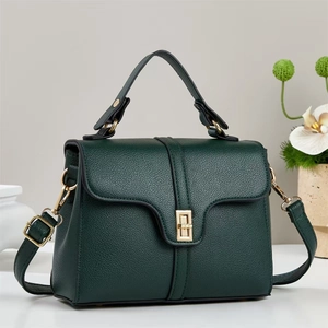 Elegant dark green pebble leather handbag with gold twist lock and adjustable strap