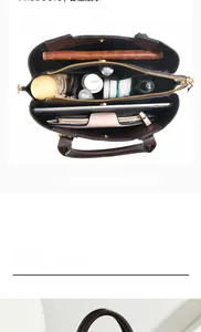 Detail view of large capacity interior with multiple compartments and zipper pockets