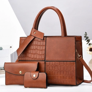 Three-piece brown tote bag set featuring stylish crocodile pattern patchwork and PU leather