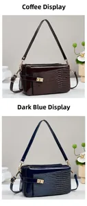 Detail of square crocodile pattern handbags in coffee and dark blue with gold hardware