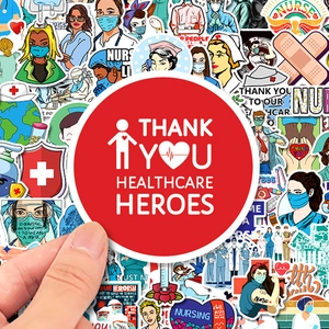 Close-up of waterproof medical stickers with stethoscope and nurse designs on hand