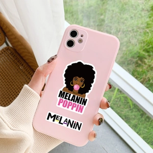 Pink phone case detail featuring Black woman cartoon and Melanin Poppin text design
