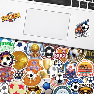 Waterproof PVC soccer stickers featuring trophies and medals on a laptop surface