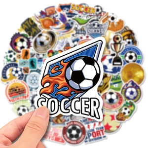 Macro detail of waterproof soccer trophy stickers with vibrant football sports designs