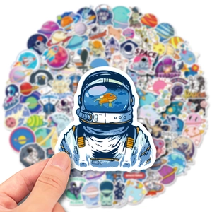 Detailed close-up of creative astronaut stickers with surreal fish bowl helmet design