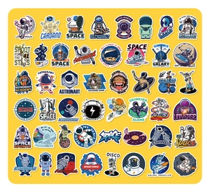 Detailed flat lay of 40 waterproof NASA-style astronaut and galaxy stickers for laptops