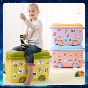 Detail of world landmark stickers on durable rolling storage bins for children