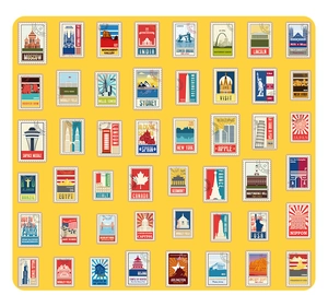 Detailed view of yellow table mat featuring vintage world landmark stamp patterns