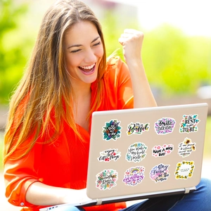 Vibrant floral inspirational stickers set shown on a laptop with a happy person