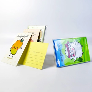 Detail of cartoon pun postcards with sheep and mango motifs and blank address fields