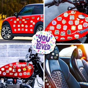 Close-up of floral motivational stickers applied on various vehicle surfaces and interiors
