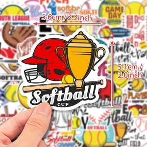 Hand holding a softball cup sticker with red helmet and trophy design, 2.2x2.0 inch size
