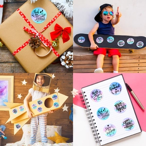 Detailed views of holographic thank you stickers applied on gifts and stationery