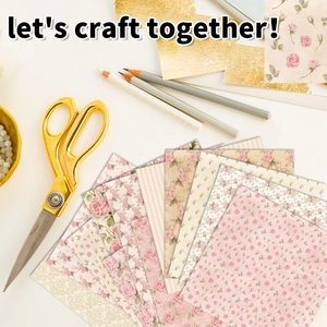 Detailed view of pink rose pattern scrapbooking paper with vintage floral craft designs