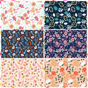 Detail view of six floral pattern scrapbooking papers with colorful botanical designs