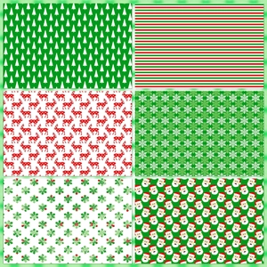 12 sheets of Christmas scrapbook paper featuring festive deer, trees, and snowflake patterns